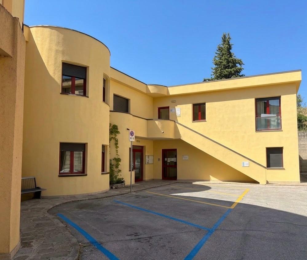 Municipio di Pietrapertosa dopo l&rsquo;intervento &mdash; corte interna e scala esterna